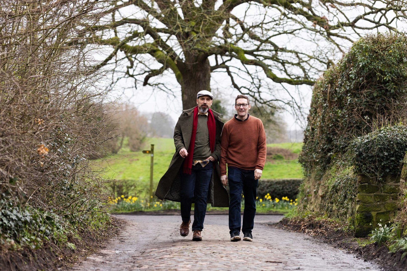James and Garry walking down a village lane